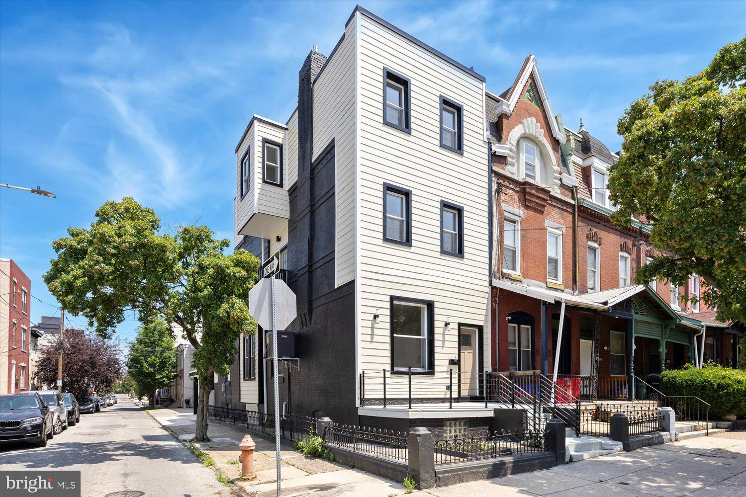 Welcome to 4063 Spring Garden Street – a stunning, fully renovated home offering 5 spacious bedrooms, 3 luxurious bathrooms, and garage parking,, a rare find.
Step inside to find a bright and airy open-concept layout with wide-plank hardwood floors, modern recessed lighting, and oversized windows that flood the home with natural light. The expansive living and dining space flows seamlessly into a designer kitchen featuring:
Custom European-style flat-panel cabinetry
Sleek quartz countertops with dramatic veining
Stainless steel appliances
Modern range hood and stylish fixtures
Bedrooms & Bathrooms:
Upstairs, you’ll find five bedrooms, including a primary suite with plush carpeting and ample natural light. The bathrooms are true showpieces – one with bold geometric tile work and black matte finishes, and a spa-inspired retreat featuring a soaking tub, oversized marble-look tile, and a sleek black vanity.
Additional Highlights:
Unique patterned tile floors and showers
Matte black fixtures and modern lighting
Fully finished basement – perfect for a rec room, gym, or extra storage
Ceiling fans throughout
Crisp white walls for a fresh, move-in-ready feel
All of this is located just minutes from Drexel, UPenn, Fairmount Park and public transit