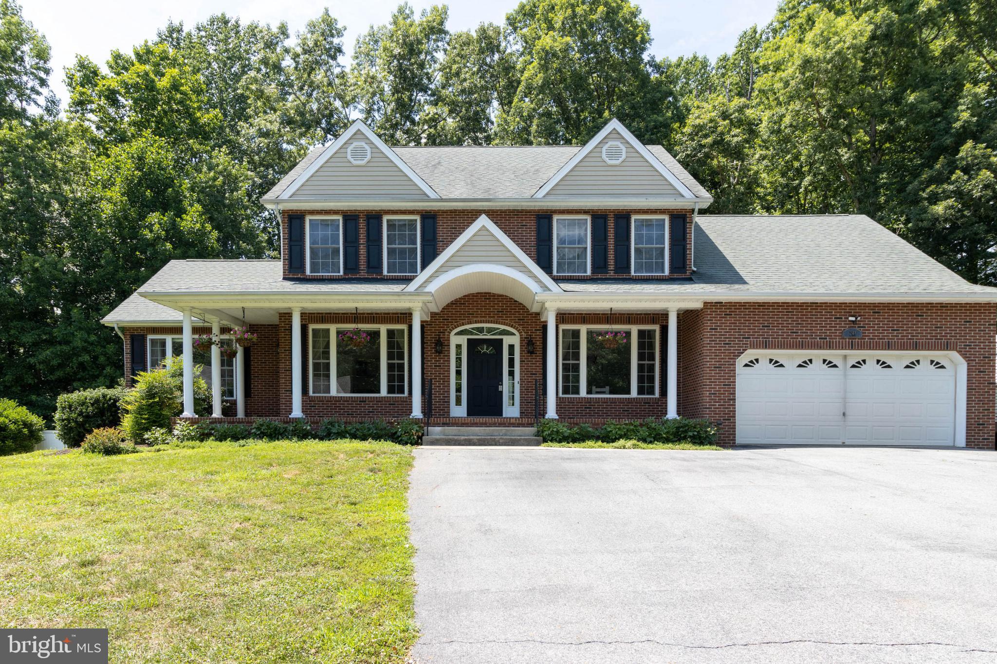 **TEMP OFF FOR SELLER TO REVIEW OFFERS**
THIS IS THE ONE! IMMACULATELY MAINTAINED GORGEOUS COLONIAL ON QUIET LOT IN THE HEART OF HUNTINGTOWN...5 bedrooms, 5.5 bathrooms...main floor and upper level features gleaming hardwood floors...spacious living area...gas fireplace...natural light beaming through newer windows...sizeable eat in kitchen...newer appliances...breakfast bar...separate formal dining room...2 master suites; one on main level and one on upper level...master baths featuring soaking tubs and stand alone showers...each of the additional ample bedrooms boasts an abundance of closet space...finished basement with an additional legal bedroom and 2 full bath...bar area affixed with a partial kitchen...laundry rooms on each level...oversized heated pool for entertaining...fully fenced in yard...professional landscaping...attached garage and driveway parking. Just a short drive to Prince Frederick shops, restaurants, and entertainment. Great commuter location to DC, PAX Naval Air Base, and VA. Don't miss your opportunity to call this beauty HOME!
