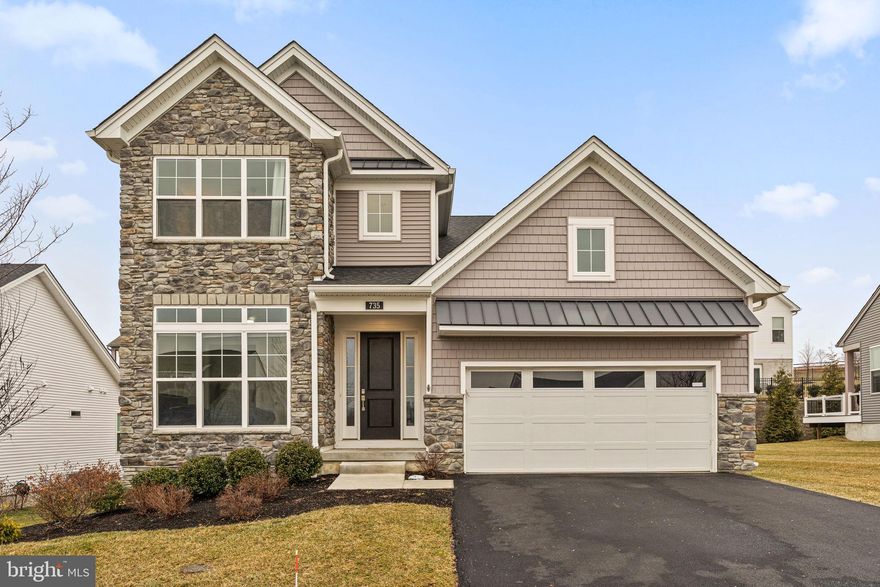 Welcome to 735 Appaloosa Road! This beautifully designed home in desirable Preserve at Marsh Creek offers the perfect blend of style, space, and functionality. From the moment you arrive, the attractive stone façade and inviting front entry create a striking first impression. Step inside to a bright two-story foyer with hardwood flooring and an elegant staircase that sets the tone for the rest of the home. The open and airy floor plan offers generous living spaces, including a formal dining room and a spacious family room featuring soaring ceilings and abundant natural light. The heart of the home is the stunning gourmet kitchen, complete with rich wood cabinetry, granite countertops, stainless steel appliances, a gas cooktop, double wall ovens, and a large center island with farmhouse sink and seating—perfect for both everyday living and entertaining. The kitchen flows seamlessly into the breakfast area and family room, creating a warm and connected gathering space. Step outside to the covered rear deck, perfect for relaxing or entertaining while overlooking open green space. The main level also includes a bedroom with access to the full hall bathroom and a flexible room ideal for a home office, den or craft room. The spacious main -floor primary bedroom offers a tray ceiling, plenty of natural light, an extension for a sitting area or home office, a private bath and a large walk-in closet. The bathroom boasts a large double vanity, step-in shower with tile surround and a bench plus a private water closet. The first floor is completed by the laundry room and access to the two-car garage. Don’t miss the full unfinished basement including an egress window and rough plumbing for a full bathroom. It’s ready to be finished or for storage! Upstairs, you’ll find the third bedroom and full bathroom plus a large loft area that provides versatile space for a second family room or home gym. This area is perfect for visiting guests! There is an oversized unfinished storage area also available on the second floor. This home comes also equipped with a whole house generator. With new carpet and fresh paint, this home is ready to make your move as simple as possible! This active 55+ neighborhood offers a clubhouse with gym facility, pool, and sport courts. All of this and just minutes to Marsh Creek State Park, Exton and Downingtown!