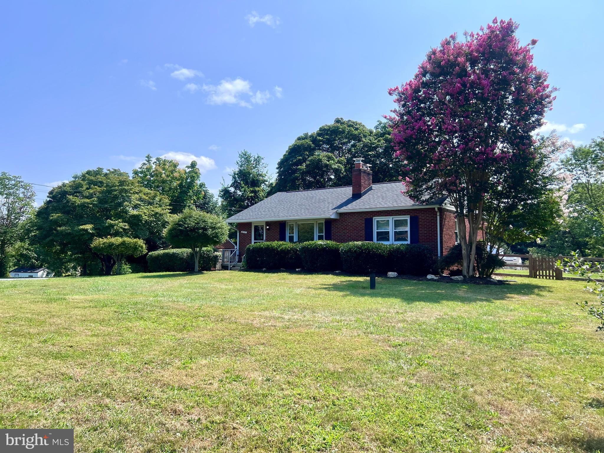 Perhaps the best buy in town! This charming all-brick home sits on nearly an acre of land and features a beautifully fenced backyard, plus a convenient storage shed along with several recent updates.
This home offers three bedrooms, two full bathrooms, and hardwood floors throughout the main level. You'll also find two fireplaces, built-in shelving, newer kitchen with SS appliances, dining area with sliding glass door to deck adding to its character. Recent enhancements include a new deck, newer roof, brand new updated bathroom on first floor, new attic insulation, finished lower level and new washer and dryer.
The lower level is fully finished and includes a full bathroom, LVT flooring, and ample storage space. It also boasts a large recreation room, bedroom/office, workout room, a laundry room, and a walk-up exit for easy access.
The amazing yard has a great fenced garden area, chicken coup, and beautiful landscaping! Professional photos and floor plan will be updated soon. This one will amaze you!
Plenty of privacy yet close to Clarksburg, shopping, dining and highways.