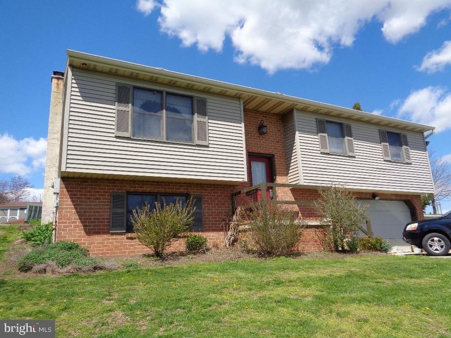 2 car garage has been converted into in-law quarters with bath & kitchenette. Great room addition w/cathedral ceiling was built in 2010. Roof, propane furnace, central air all new in 2010. Well pump & water heater new in 2013. Great view, above ground pool, orchard & Amish farmland to rear are a few amenities of this property.