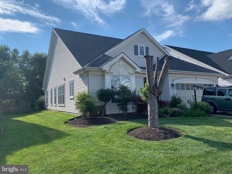 Danbury model in Heritage Hunt Golf & Country Club Active Adult community.  3 bed/3 bath, 2 levels, vaulted ceilings and loft overlooking family room.  Hardwood floors on main level, double-sided fireplace, sunroom, leading to paved patio and private backyard, professionally landscaped.  2-car attached garage. Roof replaced in 2016, water heater replaced in 2018.  Property being sold as-is.