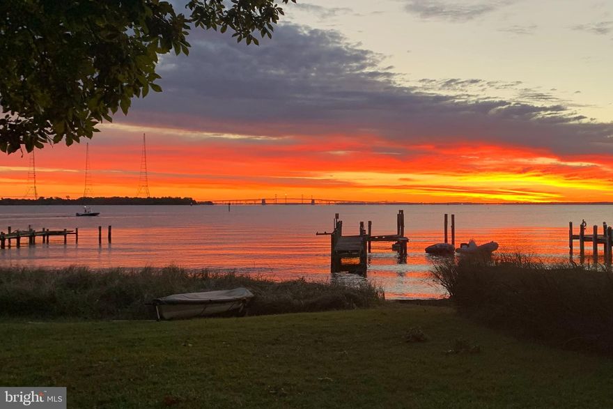 Enjoy this charming beachfront Chesapeake Bay cottage with incredible views  of the Bay Bridge and amazing sunrises while you finalize plans for your dream home. Open floor plan is filled with light, hardwood floors, updated kitchen  and comfortable spaces. Perfect weekend get a way!
Preliminary architectural drawings by Purple Cherry Architects highlight a 3 Level, 3 Bedroom home that can be built without a variance.
Property has an incredible beach but does not currently include a pier.