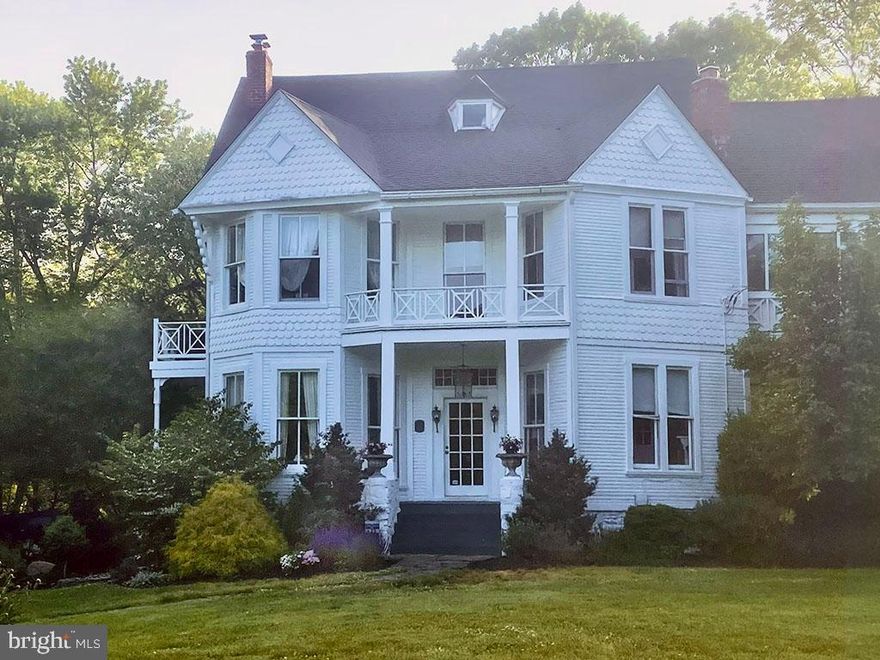 Spectacular and exceptionally rare Irregular Queen Anne Victorian, the Samuel S. Robertson House (c.1889) is a true architectural treasure designed by renowned 19th-century architect Thomas Groomes. Honored as a Montgomery County Historic Landmark, this Victorian masterpiece blends exquisite period detailing with thoughtfully integrated modern amenities...........Secluded on 2.5 lush acres, the property is approached by a picturesque cherry tree–lined driveway and surrounded by mature trees, offering privacy and tranquility rarely found so close to urban conveniences. Inside, historic craftsmanship shines alongside contemporary comfort, featuring 4 bedrooms and 3.5 baths, a spacious gourmet kitchen, and a large third-floor recreation room ideal for entertaining, creative pursuits, or relaxation...........Additional highlights include a studio or private office, a beautiful, secluded patio, and a separate exercise/gym building discreetly located off the driveway. Just minutes to METRO, this is a once-in-a-generation opportunity to own a landmark home where history, elegance, and modern living coexist seamlessly.