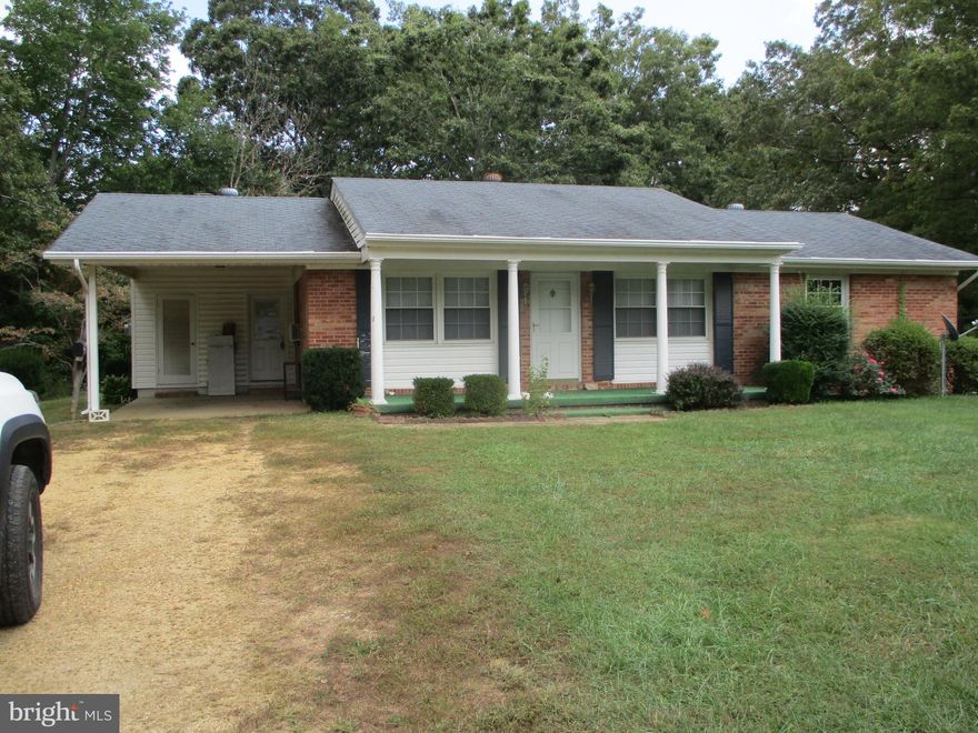 3 bedroom and 2 full bath rambler.   Nice level yard with a shed.  Home is being sold as is.   Needs work.  Hardwood floors and a carport.   Well and public sewer.