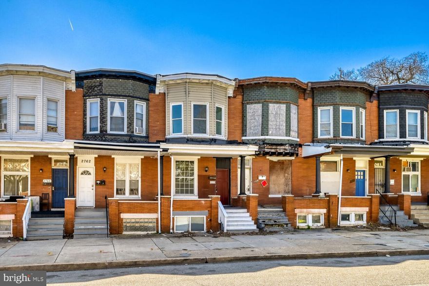 Owner being deployed and says sell! Offered for $30,000 less than previous $255,000 appraisal. Fully gutted and rebuilt 3BR/3.5BA brick rowhome with a spacious modern open layout and major systems updates throughout, including new framing, insulation, electrical, plumbing, HVAC, and NEW ROOF. Main level features recessed lighting, light oak LVP flooring, a convenient half bath, generous living and dining space, and a designer kitchen with soft-close white shaker cabinets, stainless steel appliances, a large granite island, and a huge walk-through pantry leading to the backyard. Upper level was reconfigured to create a giant primary suite with a spacious bedroom that spans three windows across, a large walk-in closet, and a beautifully renovated en suite bath with walk-in shower, classic subway tile, niche shelving, and designer finishes. Rear upper level includes a generously sized second bedroom and a stylish full hall bath. Finished lower level offers additional living/flex space, a true third bedroom with egress window, and a sleek third full bath. Seller offering a $5,000 credit toward painting or buyer closing costs. The long paved rear yard offers plenty of room for off-street parking with fence removal. Rare opportunity to purchase an incredible property under market value where no money was spared on the renovation. Centrally located in East Baltimore across the street from parks, ballfields, and the Clifton Park Community Golf Course. Don’t miss out—schedule your tour today!