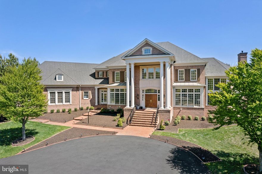 A rare opportunity presents itself to experience the best of Northern Virginia living in the heart of Great Falls. This magnificent estate features the highest standard of quality craftsmanship and finishes and boasts over 12,000 square feet of living space and an abundance of modern luxuries. The floor plan is thoughtfully laid out for elevated living and offers flexible spaces embracing both functionality and adaptability. Whether you seek a cozy gathering area for family or an open-space concept for entertaining guests, this floor plan seamlessly accommodates any needs and desires. Enjoy hardwood floors, fresh paint, built-ins, extensive molding and trim, and more. The main-level interior offers a curved staircase, living and dining rooms with elegant arched entryways, an octagonal family room with columns, marble fireplace, and stunning views of the backyard and patio areas. Just off the living room is a light-filled conservatory with floor-to-ceiling windows, and a library with French doors. The deluxe gourmet kitchen is a dream come true for any discerning chef. With its top-of-the-line appliances, preparing culinary masterpieces has never been easier or more enjoyable. Every detail in this kitchen has been carefully thought out, from the granite countertops to the ample storage space and convenient layout. This kitchen truly elevates the cooking experience, making it a joy to create delicious meals for family and friends.  The upper-level is truly an oasis of tranquility within this magnificent property, offering an unparalleled level of comfort and luxury for discerning homeowners seeking relaxation and refinement in their own home; featuring six generous bedrooms, including two luxurious primary suites and more exquisite views. The finished walk-out lower level has been carefully designed to entertain. Whether it's watching a movie in the cozy theater room, challenging friends to a game of pool in the well-appointed billiards area, or simply gathering around the fully stocked wet bar for drinks and conversation, there is no shortage of options for amusement. An additional bedroom and full bathroom make a perfect guest suite.  The home features a main-level laundry room, in addition to a master bedroom laundry room. Ample storage space throughout the entire house and a 5-car garage. Situated on over 1.75 acres, this impressive estate offers professionally landscaped grounds, extensive hardscaping, and a fully fenced backyard space with plenty of room for play. No matter the season, this is where you will want to be. Located just minutes from the Village Center, a short drive to Seneca Regional and Great Falls National Park with beautiful waterfalls, you'll have easy access to breathtaking outdoor adventures, from hiking trails snaking through verdant forests to scenic drives leading you to hidden gems and historic landmarks. Close by Reston Town Center and Tysons Corner known for world-class shopping and dining options that cater to all tastes and budgets. From high-end luxury brands to trendy boutiques, there is something for everyone.  Don't miss the opportunity to make this extraordinary home yours!