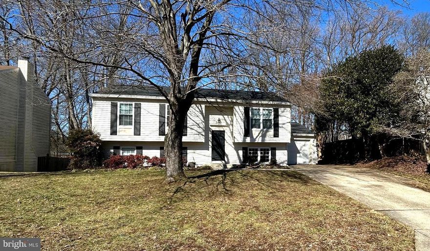 Welcome to 15006 Nebraska Drive, a well-maintained and charming split foyer home located in Bowie, MD! This inviting  and spacious home offers the perfect combination of modern updates and cozy living. 5-bedrooms, three upstairs and two downstairs PLUS and office/den upstairs. 2-full bathrooms, one up and one down.  Hardwood floors throughout. New stainless steel appliances. Washer and Dryer and Hardwood stove for coziness and atmosphere! The spacious 0.3-acre lot, with private, fenced rear yard and deck you’ll have plenty of room to relax and enjoy the outdoors. Inside, you’ll find a home that has been thoughtfully updated. Enjoy the convenience of being just minutes from Bowie Town Center, where you’ll find shopping, dining, and entertainment options. Walking trails, green spaces, playgrounds and other outdoor attractions are also in close proximity. Commuting is easy with quick access to two metro stations, the Bowie State MARC station and major highways like Route 50, 495, 95 and 197, putting you close to everything you need. This home offers it all—updated features, a peaceful location, and a well-designed layout. Don’t miss the opportunity to make this wonderful home yours—schedule a tour today! AGENTS-Please remove shoes or wear shoe covers during showings.