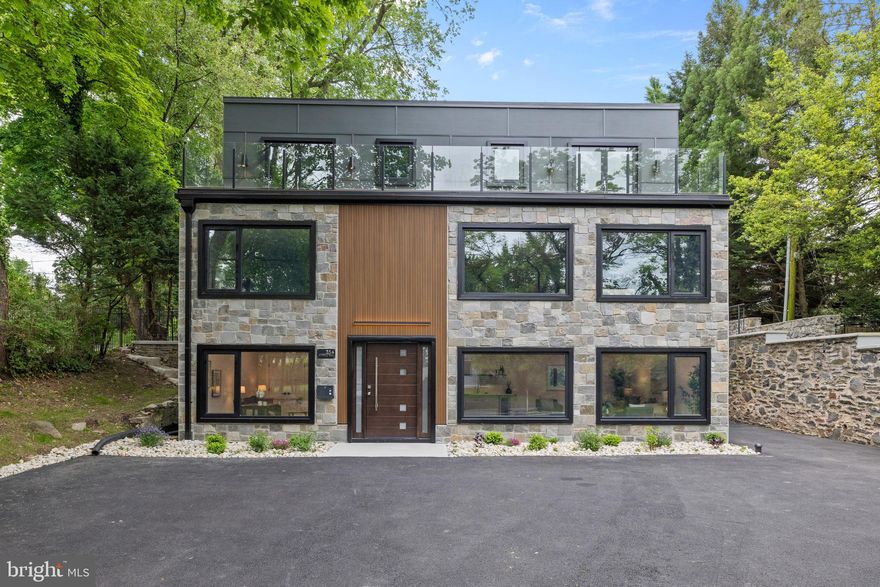 Discover unparalleled luxury in the prestigious Merion Station enclave on the Main Line. This stunning 6-bedroom, 6-bathroom home, meticulously remodeled, spans 5,547 square feet, seamlessly blending modern elegance with sophisticated functionality. Step inside to a realm of opulent design and meticulous craftsmanship. Gleaming hardwood floors and expansive kitchen highlight the charm found in every detail. Built-in surround sound systems throughout the home enhance the ambiance of every living space. A cigar humidor is conveniently located by the exterior door, ensuring easy access to enjoy a fine cigar while stepping out into the serene outdoor space. The gourmet kitchen, a chef's dream, boasts Viking stainless steel appliances, custom cabinetry, and quartz countertops, 2 Ranges, beautiful fridge, massive island, luxury sink and more! Discreet retractable charging stations add a touch of modern convenience. Indoor living spaces transition smoothly to outdoor patios, creating an ideal setting for entertaining or relaxation. On the 2nd floor also find a large room for your home theater that is pre wired with sound equipment and projector connections. Indulge in the two primary suites, each a sanctuary of luxury with ample space for your wardrobe. Spa-like en-suites feature soaking tubs, walk-in showers, Heated floors, and designer fixtures, offering moments of pure relaxation and rejuvenation. Enjoy the inviting front deck for casual gatherings, while the rear deck, accessible from the primary bedroom, offers a private sanctuary for relaxation. The expansive patio area provides a peaceful outdoor retreat. Manicured landscapes set the stage for outdoor gatherings or quiet reflection. Nestled in the sought-after Merion Station locale, this residence offers unrivaled access to the Main Line's premier amenities, from high-end boutiques to gourmet dining. With top-rated schools and nearby attractions, this home offers more than just a place to live—it provides a lifestyle of unparalleled refinement. Take the opportunity to own this meticulously curated masterpiece and elevate your living experience to new heights of luxury, Book your appointment today!