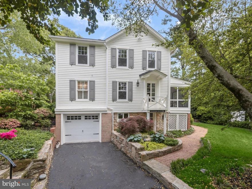 Nestled in the desirable Southland Hills neighborhood of Towson, this enchanting three bedroom, two bathroom home beautifully blends historic charm with modern upgrades. Built in 1904, it has been thoughtfully updated throughout while preserving the timeless character that gives it warmth and appeal. Natural light pours through windows in every room, offering serene views of the surrounding greenery and mature landscaping. Inside, Pine floors and a neutral color palette create a bright, airy ambiance. The spacious living room invites you to unwind, featuring built-in shelving that frame a cozy wood-burning fireplace. Completely renovated, the kitchen was designed with both style and function in mind, boasting stainless steel appliances, granite countertops, a tile backsplash, and 42” soft-close cabinets enhanced with undercabinet lighting. Just off the kitchen, the breakfast room is made for casual meals and features a vaulted wood-paneled ceiling and brick flooring, with direct access to the backyard. Entertain with ease in the elegant dining room, where built-ins offer additional storage. A den provides a versatile space that is perfect for an bedroom, office, playroom, or lounge area. The full bathroom on this floor includes a tub shower and classic blue penny round tile flooring. A welcoming entryway foyer with a convenient laundry closet adds to the home’s practicality. One of the home’s highlights is the screened porch, an ideal spot to start your day with coffee or unwind in the evening while taking in the peaceful sights and sounds of nature. Upstairs, hardwood floors continue into all three bedrooms, each with ceiling fans. A beautifully renovated full bathroom with stylish accent tile and a tub shower serves this level. Step outside to discover a serene setting on the 0.35-acre lot, where mature trees, lush greenery, and meticulously manicured landscaping create a private oasis. The fenced backyard features a spacious brick patio and a lawn, offering plenty of space for hosting gatherings or enjoying quiet moments outdoors. Additional features include an unfinished basement with ample storage space, a one-car garage, and a long driveway.