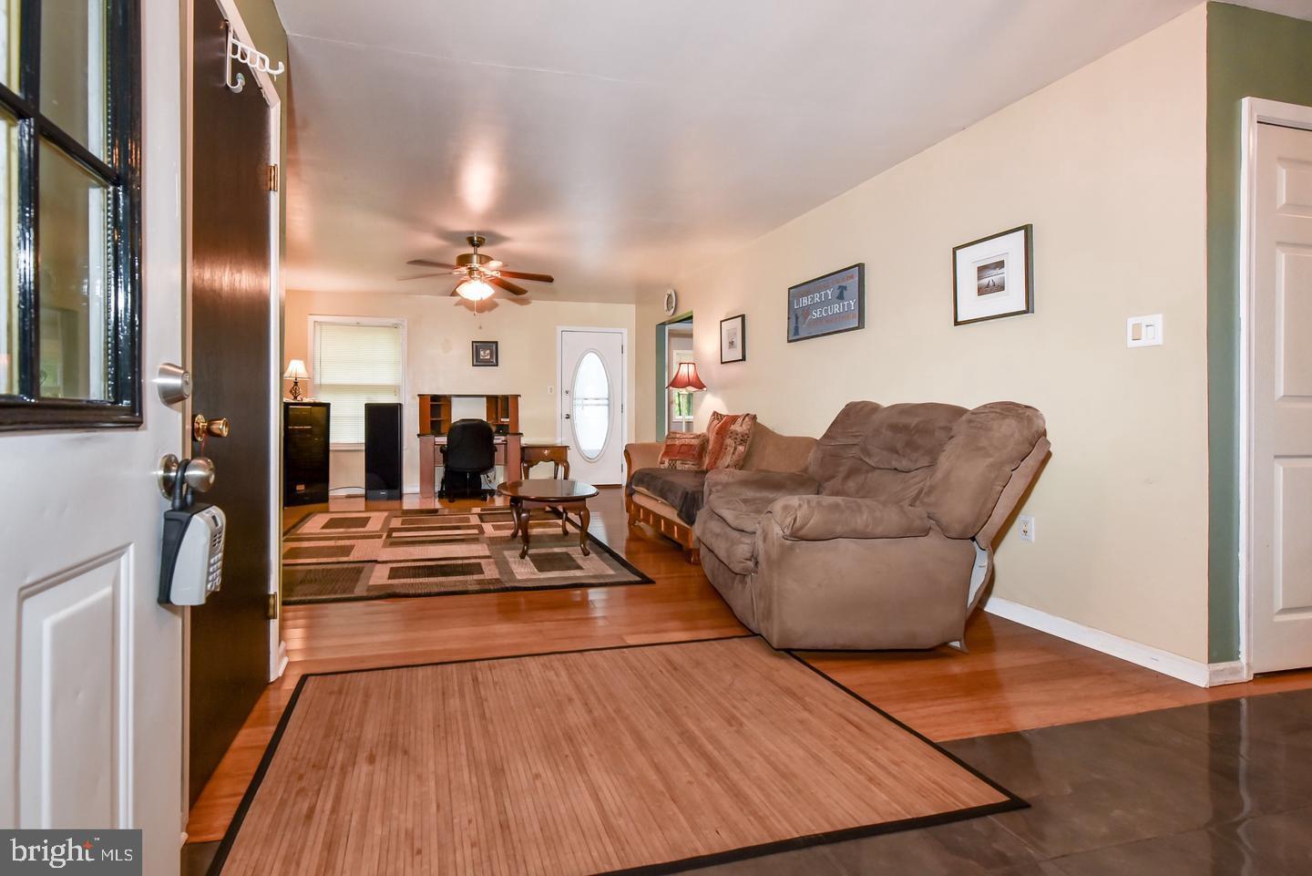 Rancher sited on 2.78 private acres. Split floor plan. Bamboo flooring throughout. Screened porch, deck, Master w/private bath and walk-in closet.