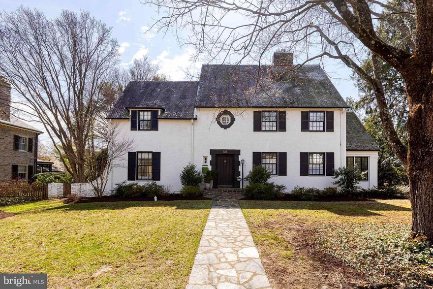 This 1935 masterpiece perfectly blends historic Homeland elegance with a total modern renovation. The striking exterior and manicured level yard deliver unmatched curb appeal on one of the neighborhood's premier blocks. The home features expanded living spaces, including a bright sunporch and an impressive chef’s kitchen with a generous informal dining area. Retreat to the serene primary suite, a private sanctuary complete with a cozy fireplace, large walk-in closet, and luxurious ensuite bath. With 5 spacious bedrooms, 4.5 baths and a large finished basement featuring a full bath, there is room for everyone. Enjoy a seamless transition to a private outdoor patio and enjoy al fresco dining or lounging in highly coveted Homeland. Photos simply don't do it justice—this is a home you must experience in person and take it all in.