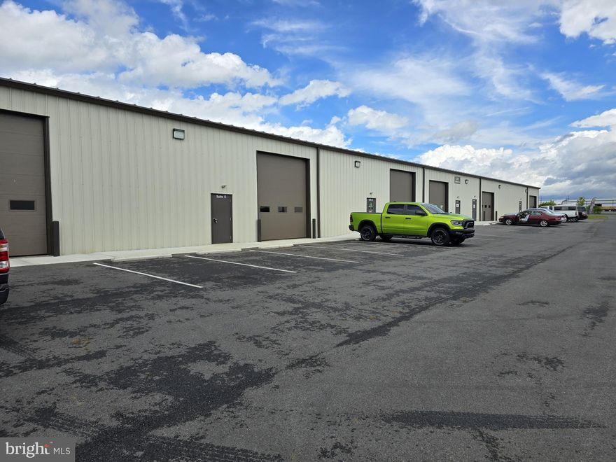 Like new Flex space.  Has a light build out complete with some partitioning and a bathroom.  Will make a great space for many uses.  2,000 s/f in this space with a community loading dock.
