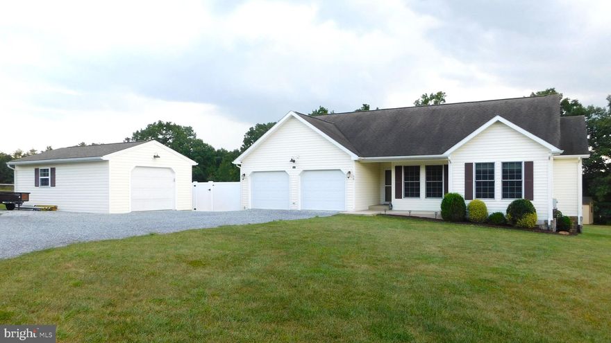 This well cared for home is waiting for its new owners! The owners pride shows throughout this wonderful Rancher. Situated in the country, but not far from shopping, banks, schools and commuting areas!  This home offers 3 bedrooms, 3 full baths, Large open kitchen, dining and living room. The finished basement offers many options. With an exercise room or make it a craft/hobby area, it also would be great as an office. There is a family/media room and a game area with a beautiful built in bar. Walk out level basement with its own small concrete patio. The back yard backs to trees for privacy. The yard also has many beautiful mature trees throughout the front and backyard. The covered back deck off the Living/Dining area is great for entertaining. This home also features an Inground heated saltwater pool that is 14x24 with a 3–5-foot depth. Plenty of storage with a 2-car attached garage, detached 1.5 car garage with electric, heat and insulation, there is also a 12x24 storage shed with electric.
