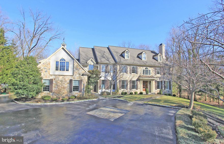 Step inside this 6 bedroom, 4 full & 3 half bath home and fall in love!  The harmony of form, scale & proportion is gracious & sophisticated yet always comfortable.  Outside, admire the hand cut          stone work and flagstone walkways, cobblestone lined driveway, rear stone patio with outdoor kitchen and fire pit.  Inside, find an immaculate home with all the luxuries desired at this price point.  Simply put, this property must be seen to be appreciated.  215 S. Fairfield Road offers a lifestyle and level of privacy and convenience that is unmatched.