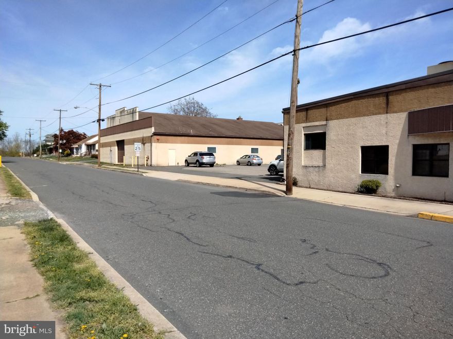 ANOTHER 422 OPPORTUNITY !!! 21611 sq feet of industrial building in the heart of Boyertown. Property owner has sold business and is disposing of unneeded real estate.  The easiest description of the floor plan is a horseshoe w/ employee parking in the center of the horseshoe. On either side of the horseshoe is work area. Generally speaking, work area is heated, cooled and sprinklered. A substantial cartway connects both sides of the horseshoe and it is heated, cooled and sprinklered also. Men, material and equipment move through and are stored in this cartway, The north side of horseshoe has front and rear overhead doors w/ a freight shipping-receiving addition built onto back of building where rear overhead door is. This loading area is further served by a drive-in door and dock. Air lines run the interior perimeter of this northern section. On south side of horseshoe there is 2500 sq feet of 2nd floor office space along w/ other large work areas and employee lunchroom.  Floor plan easily lends itself to using half, leasing half and you ve covered your mortgage-do the math!!! Investigate a 10% down SBA 504 loan and your cash needed might be a lot less than you think. Building is served by public water, sewer. gas and 3-phase 440 volt Please look for additional info/docs added in the near future-this facility has a lot to it. Building tours M-F, 9-3. Please see virtual tour by clicking video icon above pic. Floor plan in docs.