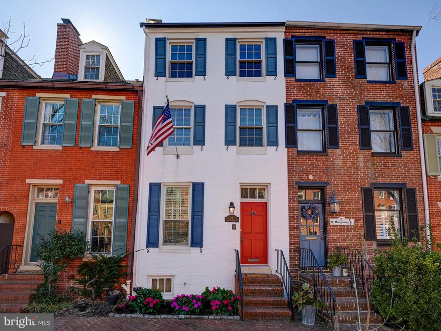 Charm abounds in this one-of-a-kind opportunity in one of the best Federal Hill locations.  Renovated from top to bottom just over three years ago, this beautiful light-filled 4 bedroom, 2 1/2 bath row home is on a premier block in Historic Federal Hill. The home offers pine hardwood flooring and ceramic tile flooring throughout. Recessed lighting and upgraded lighting fixtures enhance the rooms. The large living room features plantation shutters, high ceilings, built-ins, and a gas fireplace for those chilly nights. The separate dining room with curved walls and crown molding also has an alcove for a bar or serving table. A gorgeous gourmet renovated kitchen has granite counters, updated cabinets, ceramic flooring, stainless steel appliances, and a kitchen bar top with built-in seating. The kitchen opens to a private back patio for entertaining. Custom shades and blinds add to the warmth of the home. The main floor offers a half bath. Enjoy two large bedrooms on both the second and third floors with renovated full baths on each level. Pine hardwood floors accentuate the beauty of the bedrooms/hallways, along with high ceilings. Two of the bedrooms include ceiling fans. The light-filled rooms continue throughout the home and wide stairs for moving furniture. Finally, head up to the huge rooftop deck with stunning views of the Baltimore City skyline. Includes an updated roof cover and awning. Invite your family and friends to join you and watch fantastic views of fireworks and gorgeous sunrises/sunsets. The huge, full stand-up basement (length of the entire house)is great for storage. Stroll to the Inner Harbor or Federal Hill Park or Rash Field. Enjoy all the restaurants and sporting events (Baltimore Ravens, Baltimore Orioles) the city and Federal Hill have to offer. Grab a bite at the newly renovated Cross Street Market. Close to I95 and I83 for easy commuting. Walk to the Camden Light Rail or Camden MARC train that runs to Union Station DC or take a free Circulator bus throughout the city (stop is right up the street). This location has so much to offer!!