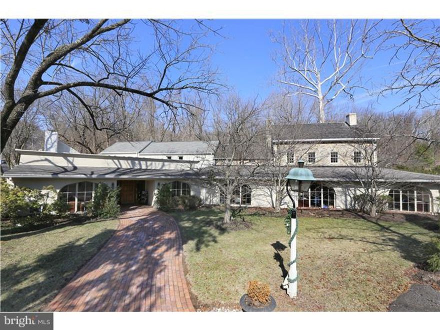 One of the most picturesque commercial properties in Solebury Township, currently featuring a large office building overlooking the pond and fountain, two large parking lots, surrounded by mature trees in a classic Bucks County setting yet prime highway exposure on State Route 202 just over the bridge from New Jersey. 2 structures on property, also includes a two bedroom dwelling (long term tenant occupied), new septic systems, recently renovated.  Consult Solebury Township Zoning for approved uses. Previous uses include restaurant and antique center.