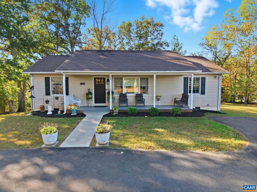 Step inside this beautifully updated home where style, comfort, and scenery come together.  The open floor plan fills the space with natural light and creates an effortless flow between the living, dining, and kitchen areas.  The kitchen offers you quartz countertops and a farmhouse sink! The large living room windows frame stunning mountain views. This home offers several updates such as new flooring throughout, new paint throughout, new gas logs, and the HVAC is only 2 years old, septic was recently pumped. Located just minutes from the Shenandoah National Park and surrounded by the area's best wineries, breweries and restaurants, this home offers the perfect balance of modern living and mountain adventure.,Quartz Counter,White Cabinets,Fireplace in Living Room
