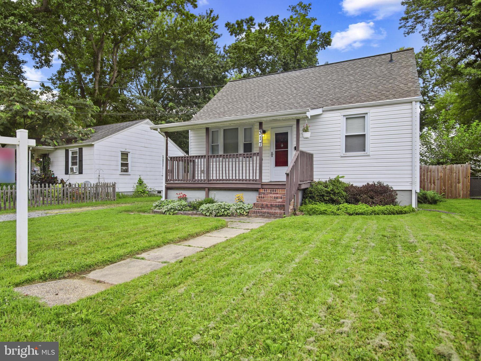 Well maintained Cape Cod in historic Middleborough. Newer roof and brand new siding. Freshly painted. This home boasts a private primary suite upstairs, two bedrooms on the main level, and a potential fourth bed/office in the basement. Beat the heat in your breezy open living/dining/kitchen area or in the lower level rec room. In the backyard, you'll find a gardener's delight- fully fenced with water irrigation system and veggie patch already in bloom. Are you a sunrise or sunset person? Enjoy both from your new front porch! Multiple marinas nearby your boat. Upgrade your summer in this water access community!