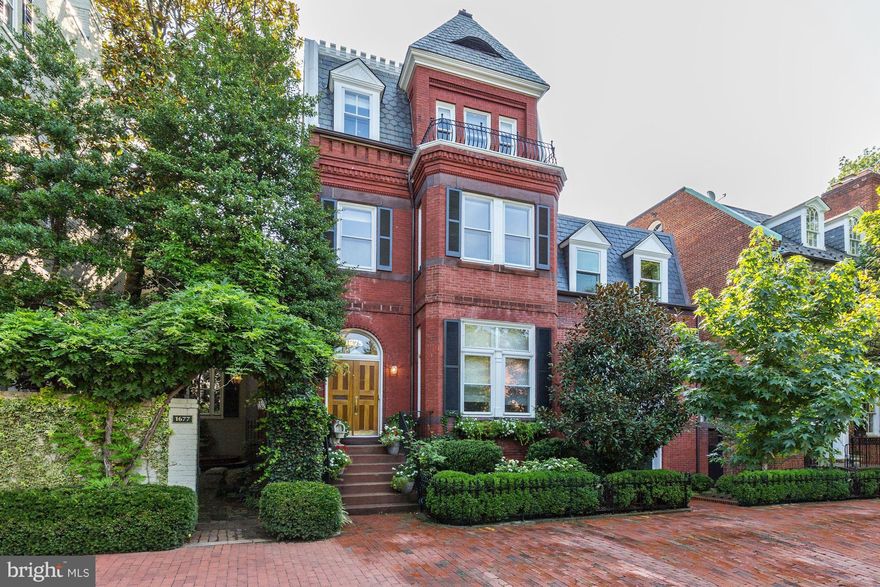 Beautiful Federal style home in the heart of Georgetown boasts 5BR/5BA & 2HB & has hardwood floors throughout. Main level features soaring ceilings w/ a spacious living room, dining room, & library. The kitchen is flooded w/ light & has views of the rear garden. Master suite offers a separate sitting room w/ fireplace. Lower level has a gym, theater & incredible wine cellar. 2 car garage parking.