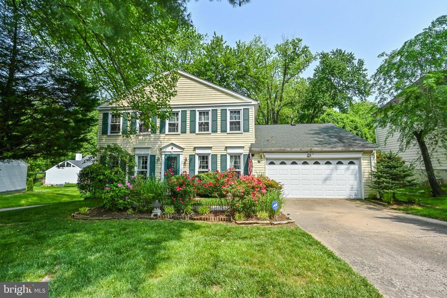 ** ALL OFFERS TO BE REVIEWED  AT NOON ON TUESDAY, JUNE 6th ** AMAZING opportunity!!! The Brentwood Model is the largest floorplan in the neighborhood! Step inside to find a large living room and formal dining room with bay window overlooking tranquil backyard. Enjoy cooking meals in the updated kitchen with granite counters, gas cooktop and breakfast room. Kitchen sliding glass doors step out to large deck overlooking mature trees. Curl up by the cozy brick fireplace in the family room off kitchen. Work from home in the main level office! Half bath and mudroom also on the main level. Step upstairs to find a spacious primary suite with private bath. 3 additional bedrooms and full bath complete the upper level. Unfinished basement has loads of potential! Basement walks out to patio and huge, flat fenced in rear yard. Oversized 2 car garage. Lovely landscaping. New HVAC in 2022. Minutes to VRE and walking distance to bus stop, elementary school, Old Keene Mill Swim & Racquet Club and Rolling Valley Shopping Center.