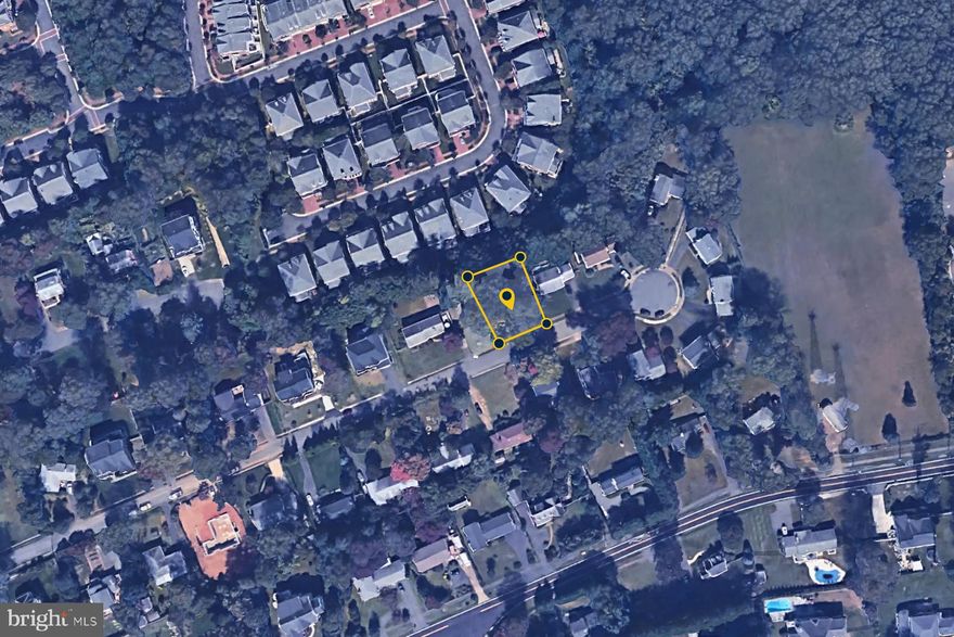 All offers due by noon on Monday.  Rare opportunity to own pristine land in highly desirable Haycock/Longfellow/McLean High School pyramid.  Build your dream home on a gorgeous, flat lot (survey indicates 10,505 SF), populated with mature trees. 
Two aprons provide convenient driveway access and the sidewalk provides safe, off-street passage.  Nestled on a quiet street that ends in a cul de sac, Montour Heights is an established and close knit community with no HOA fees.  Access Fairfax County Haycock/Longfellow Park at the end of the cul-de-sac and be surrounded by nature on walking trails that will delight your family and pets.  Enjoy the paved pathways to both elementary and middle schools. The community offers swimming pools, tennis courts and an abundance of choices for shopping, restaurants, and entertainment as well as being close to major convenience shops.    Terrific central location for getting around town and just minutes to the heat of Falls Church City, Tysons Corner or Washington, DC.   West Falls Church Metro  is .7 miles and there is easy access to major commuter routes, airports and public transportation.  Lots/land in this neighborhood rarely come on the market and this hidden gem affords you many options in 2025 for realizing your amazing future.