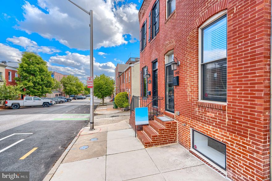 Beautifully updated end-of-group Canton townhome filled with natural light and added privacy. This spacious three bedroom, three full bath home features hardwood floors, an open layout, and a modern kitchen with granite countertops and stainless steel appliances.

The finished basement offers flexible living space, while the expansive two tier rooftop deck delivers stunning city views, perfect for relaxing or entertaining. Located just steps from Canton Square, Patterson Park, and the waterfront, this home offers the best of city living with unmatched walkability.