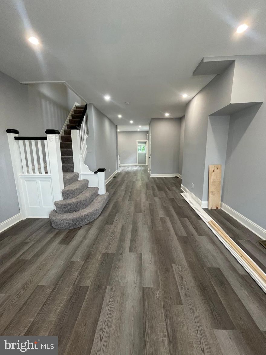 Live at 5414 Whitby St in Cobbs Creek, a beautifully renovated home offering modern comfort and style. This home boasts three spacious bedrooms and one and a half newly updated bathrooms featuring elegant subway tile accents. The kitchen is designed with brand-new white shaker cabinets, generous cabinet and counter space, and stainless steel appliances that will be installed before move-in. The interior is bright and open, with abundant natural light flowing through large windows. Each bedroom offers ample space and sizable closets for convenient storage. Enjoy a private backyard, perfect for relaxing on warm days. Be the first to call this stunningly refinished property home!