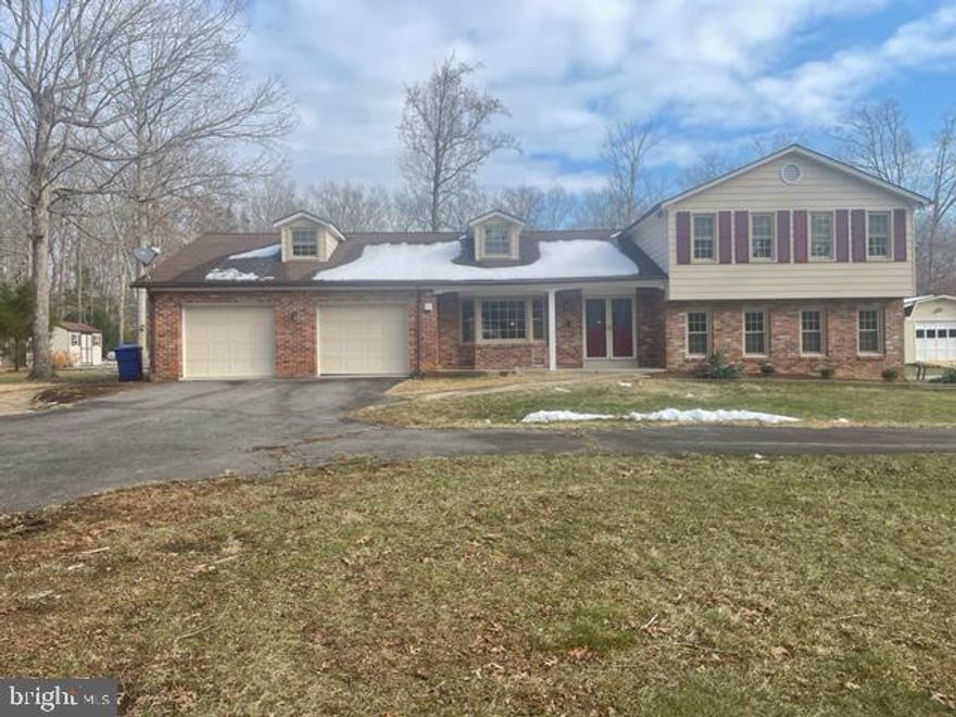 This is a stunning renovation on a beautiful 3 plus acre level lot. 2 car garage,  oversized 1 car detached garage plus 3 car carport! Inground pool. Sceened porch with hot tub.. The inside boast a beautiful New kitchen with granite and stainless appliances. Harwoods on main level. Updated baths. New light fixtures.  New carpet ! Large family room with beautiful brick work wood stove.  This one will not last and is a must see!