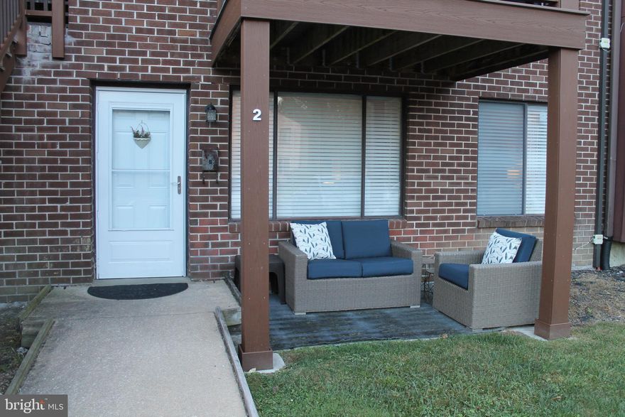 Discover this gorgeous one-bedroom condo situated on the ground floor of the Hilltop Condo Complex. This bright and airy unit boasts a modern open floor plan that seamlessly integrates the living, dining, and kitchen areas. Enjoy the elegance of luxury vinyl tile flooring throughout, complemented by granite countertops and stainless steel appliances. The spacious bedroom features a convenient wardrobe unit, while the renovated main bathroom offers a roll-in shower with grab bars for added safety. The Hilltop development is ideally located next to the Brookhaven shopping district and is just a short distance from downtown Media.  Agent is related to the sellers.