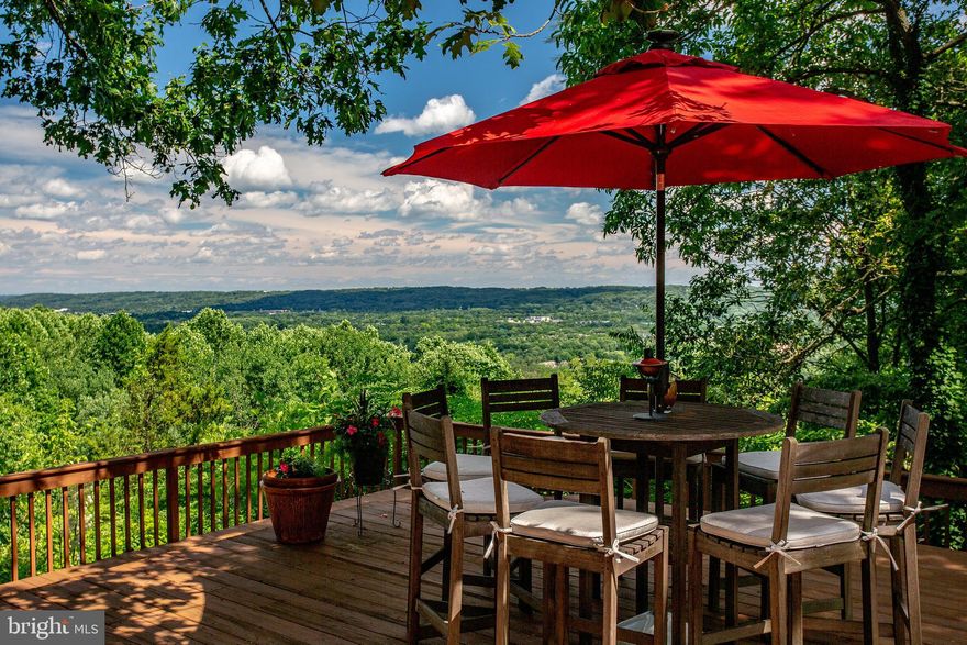 Listing Temporarily withdrawn.  See Cary Simons for details. Tranquility awaits at this one-of-a-kind custom-built contemporary home situated atop Valley Forge mountain with breathtaking views. The magnificent, expansive outdoor spaces and serene setting create this ultimate Zen-like retreat. The unique floor plan offers an abundance of living space that is perfect for multi-generational living or an au pair suite, with both levels of the home offering bedrooms, living quarters, kitchen/kitchenettes and outdoor spaces.  The eclectic interior provides a combination of modern elements such as airy vaulted rooms with soaring two-story spaces and gorgeous windows that provide streaming natural light, yet intimate tucked away spaces, making it perfect for entertaining and family living.  Enter the circular driveway that leads to a courtyard that welcomes you into the home. A modern floating staircase sweeps through the 2-story foyer with the backdrop of natural elements of a stone wall and foliage seen through the geometric windows. The foyer leads to a stunning, gourmet kitchen with top of the line finishes and stainless steel appliances, including a professional Thermador 6-burner gas range with griddle and hood vent, a Viking refrigerator and a wine refrigerator, a breakfast bar, gorgeous granite countertops and striking backsplash, a vaulted ceiling with exposed beams, recessed and pendant lighting. The kitchen flows into a lovely living room with a wood-burning fireplace and a vaulted ceiling with exposed beams. The dining room is located adjacent to the living room and has an extraordinary, soaring 2-story space that is open to the upper level living area. Continue from the living room into the indoor pool area complete with a wet bar/kitchenette, a full bathroom/changing room and radiant heat. Over-sized sliding doors can be accessed from various rooms of the home so one can enjoy the plethora of tiered outdoor terrace and patio areas.  Enjoy the ambiance of the outdoor setting and soothing sounds of a water feature that runs along the side deck area.  The first floor of the home also includes a large sunroom with radiant heat, a vaulted ceiling and skylights, a theater room with stadium seating, 3 bedrooms, 2 full bathrooms, a home office, mudroom/laundry and access to the attached, oversized 4-car garage with 14 ft. ceiling and a pottery studio. The upper level of the home boasts a second spacious living room with a kitchenette and access to the upper level deck. The large master bedroom suite with vaulted ceiling and open floor plan includes a 3-way fireplace that can be enjoyed from the jacuzzi or bedroom.  The spacious master bathroom was custom designed with striking finishes such marble and glass block walls, a walk-in shower, double vanity and make-up vanity. A walk-in master closet and spiral staircase that leads to a bonus loft area. Sliding glass doors from the master bedroom provide access the upper level patio.  Located at the opposite wing of the second floor, just beyond the living room area, you will find additional sleeping quarters and a full bathroom. This space can be used as 3 bedrooms, or it can be configured as its own suite that includes separate access via a spiral staircase to the garage. There is also a powder room located on the upper level. The property also offers a separate 2-car detached garage. That's a total of 6-car garage parking and more if one were to add a lift in the attached garage. Located in the highly sought after Tredyffrin-Easttown School District!  Close in proximity to Route 202, PA Turnpike, the Paoli train station, Valley Forge Park, Great Valley Corporate Center and world-class shopping at King of Prussia Mall & Town Center!  Valley Forge Mountain swim, tennis and social club are right down the road. The home was rebuilt and expanded in 1990 and includes 5,200SF of outdoor deck space, zoned-HVAC system, 400 amp electric service, new roof 2011 & 2017.  2 Year Home Warranty!