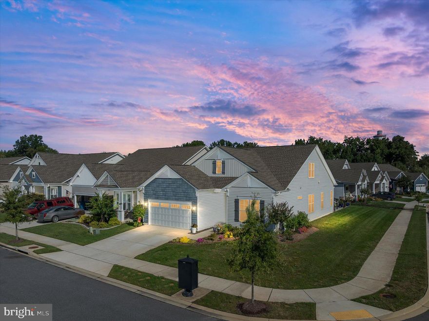 If you’ve ever dreamed of waking up and feeling like you’re on vacation—but with the comforts of home—welcome to 135 Nauset Lane.

Tucked into a quiet corner of Kent Island’s Four Seasons community, this home isn’t just beautiful—it’s part of a lifestyle that’s hard to find and even harder to leave. The sellers were first drawn here by the energy of the community and the resort-style amenities. But what really sold them was the way this home made everyday life feel easy, peaceful, and a little bit indulgent.

From the moment you walk through the front door, the open layout just flows. The gourmet kitchen is the heart of the home—with a massive island, double ovens, gas cooktop, and more cabinet space than you’ll know what to do with. It opens to a sunny dining area and a living room that invites you to sink in and stay awhile.

Downstairs, you’ll find two spacious bedrooms, including a primary suite that feels like a retreat. The spa-like bathroom, walk-in closet, and tray ceiling add a touch of everyday luxury. There’s also a den that can flex into a home office, reading room, or whatever you need it to be. Upstairs is a private guest suite with a third bedroom, full bath, and a bonus loft space that’s perfect for movie nights or extra living space.

But the magic continues outside. The oversized patio was made for entertaining—complete with a built-in firepit, gas line for your grill , and even a five-person Thermospa hot tub. Whether it’s coffee in the morning or wine after sunset, this is where you’ll want to be.

Other thoughtful touches? There’s a heated and cooled garage with extra space for a third vehicle or golf cart, and a sky basement for bonus storage. Throughout the home, you'll find upgrades like luxury vinyl plank flooring, under-cabinet kitchen lighting, custom bathroom finishes, recessed lighting, and so much more.

And then there’s the community.

Four Seasons at Kent Island is truly one-of-a-kind. Want to start your day with yoga? Go for a paddle on the river? Meet friends at the outdoor bar to catch the game by the firepit? It's all here. There’s a 24,000 sq ft clubhouse, both indoor and outdoor pools, a state-of-the-art gym, game room, pickleball and tennis courts, walking and biking trails, a pier for fishing and boating, a kayak launch, and even a dog park.

The community is tucked away, peaceful and private—but you're just minutes from restaurants, wineries, breweries, and shops. And if you ever need a city fix, Annapolis and Easton are an easy 20-30 minute drive away.

The best way to describe this home and community? It’s a place where life slows down in the best way. Where neighbors become friends. Where the to-do list gets a lot shorter—and the “want-to-do” list gets a whole lot longer.

So if you're looking for more than just a new house—if you're ready for a new chapter filled with connection, ease, and everyday joy—135 Nauset Lane might be exactly what you’ve been waiting for.