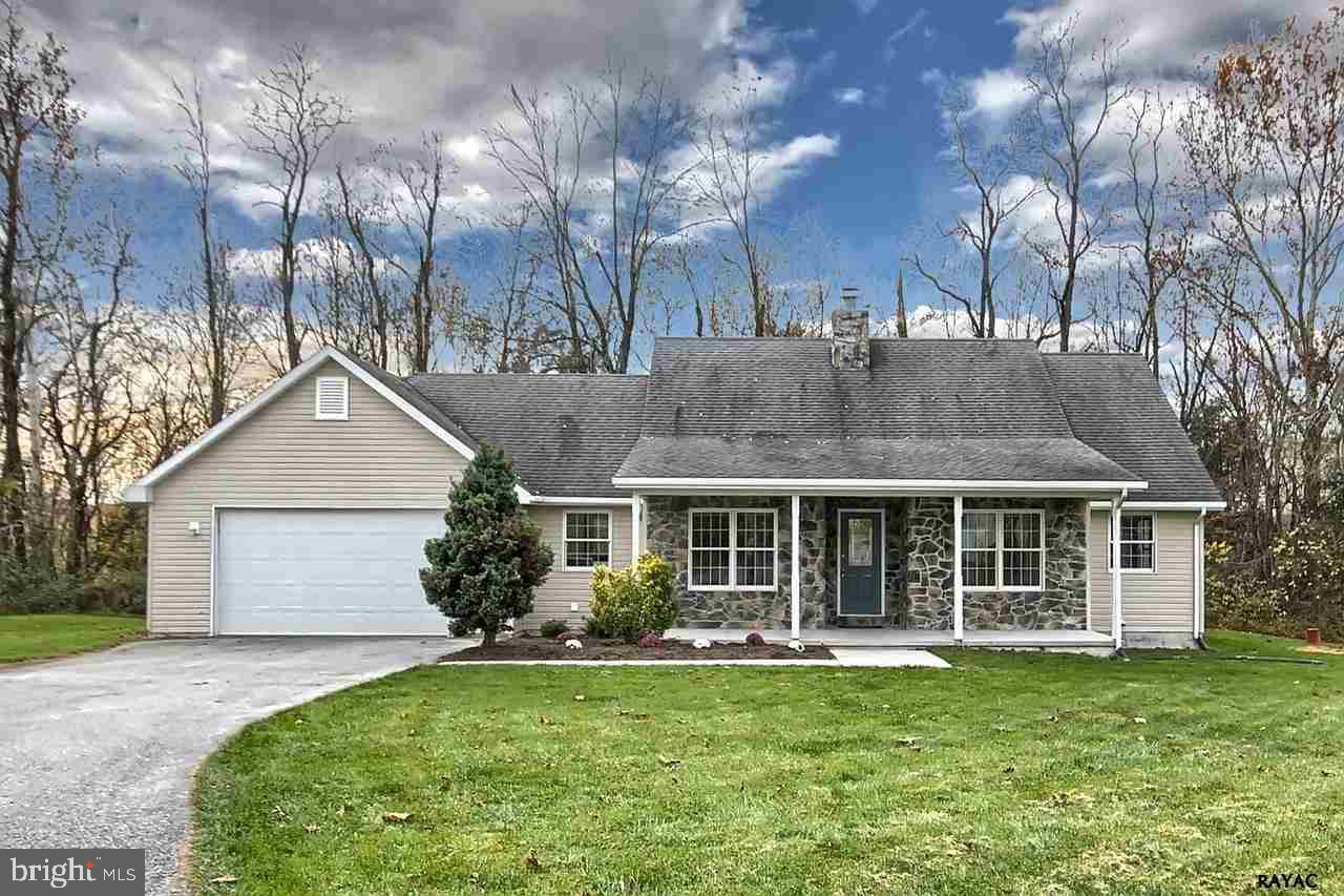 Country Setting. Custom Built Rancher-open floor plan on 1.71 acres. Family Room with stone wood burning Fireplace,laminate floors. Master BR with new carpet. Master Bath w/ walk in closet, double vanity and WhirlPool Tub. Large Kitchen with corner sink & large island with Jenn-Air gas range. Lots of cabinets and double oven. Large two car garage.