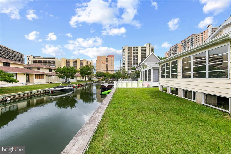 WATERFRONT OPPORTUNITY in a Prime OC Location! Bring your boat and your beach gear! Vinyl 60' Bulkheaded waterfront on a wide canal with direct water access, just minutes to open bay. Whether you're looking to cruise, fish, or kayak, you'll love having the water right out your back door, plus NO HOA means more freedom to enjoy your property. 3 bed, 2 full bath home with second floor loft for extra storage. Attached garage has storage above as well. Updates include NEW HVAC (2025), NEW appliances (2022), and NEW roof (2021). One of the best features? Channel Buoy Rd ends in a traffic light, giving you easy, safe access onto Coastal Hwy and easy cross to the BEACH. Great location in North OC close to restaurants, bars, shopping, and beach fun!