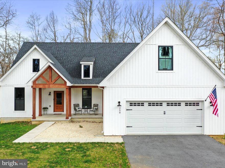 Experience the best of modern living in this breathtaking custom home, located in the sought-after Lake Forest Estates. Completed in 2022, this 4-bedroom, 3.5-bathroom home is the epitome of contemporary design, offering a blend of luxury, functionality, and style throughout.

As you enter, you're welcomed by an expansive open-concept layout with soaring vaulted ceilings and an abundance of natural light. The grand family room, with its beautiful fireplace, creates a warm and inviting space to relax or entertain. The gourmet kitchen is a true highlight, featuring upgraded cabinetry, stunning granite countertops, and a massive 6-foot island that serves as the heart of the home for cooking, dining, or socializing.

Just off the kitchen, the custom laundry room, complete with a sink, makes household chores a breeze. A thoughtfully designed half bathroom rounds out the main floor for your convenience.

The luxurious primary suite is your own private oasis, offering a tranquil retreat with tray ceilings and an elegant en-suite bathroom. The bathroom boasts double sinks, a custom soak-in tub, a beautifully tiled walk-in shower, and a spacious walk-in closet, making it a perfect space to unwind after a long day.

On the main level, you'll also find two generously sized guest rooms and a full bathroom, offering comfort and privacy for family or visitors. The upper level features an oversized 4th bedroom, ideal for a guest suite, home office, or media room. This room includes a full bathroom and walk-in closet, providing flexibility for your unique needs.

The walkout level basement is a blank canvas, ready for you to design your perfect space. Whether you're looking to create a home gym, entertainment area, or additional living space, the possibilities are endless. 

With high-end finishes and a thoughtful, functional design, this home offers everything you need for a life of comfort and convenience. Don’t miss out on this rare opportunity to own a custom-built home in Lake Forest Estates—schedule your private showing today and make this dream home yours!