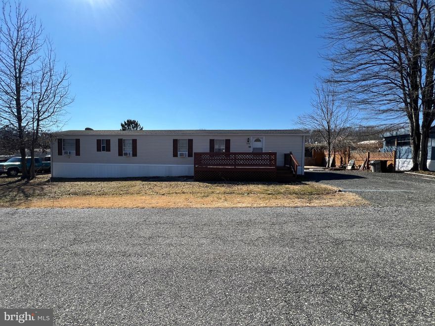 RARE HARD TO FIND 3 BEDROOM HOME.     HAS HAS LARGE FAMILY ROOM AND KITCHEN WITH PLENTY OF KITCHEN CABINET SPACE.    IMPROVEMENTS INCLUDE ALL NEW FLOORING AND FRESHLY PAINTED.   ALL WINDOW A/C UNITS CONVEY.    LARGE BASE TO PUT IN A NEW SHED.
PLENTY OF ON STREET PARKING AND CARPORT FOR 2 CASRS.   CONVENIATLEY LOCATED TO ROUTE 40 AND INTERSTATE 95 AND ONLY 20 MINUTES TO DOWNTOWN BALTIMORE.   BEST OF ALL THIS HOME HAS THE LOWEST SITE RENT AROUND AT ONLY $755.00 PER MONTH.    LOOKING FOR  AFFORDABLE HOUSING AND A GREAT HOME THEN THIS HOME IS FOR YOU AT ONLY  $1,350  PER MONTH TOTAL.     THIS HOME IS A MUST SEE!!!!!