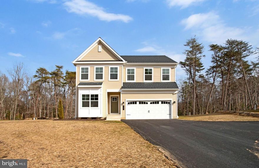 HOME IS MOVE IN READY!   Discover the Monroe — a beautifully crafted new construction home that blends modern comfort with timeless design. Step into an open-concept layout that seamlessly connects the living room, dining area, and kitchen—an ideal setting for both everyday living and entertaining. A 2-foot cantilever extends the great room, providing additional space and enhancing the home's spacious feel. At the heart of the home, a generous kitchen island invites casual dining and easy meal preparation. Outfitted with stainless steel appliances and ample cabinetry, this kitchen is designed to meet the needs of both daily routines and special gatherings. A charming bay box window fills the front room with natural light, creating a bright and flexible space perfect for a home office, reading nook, or personalized retreat. The owner’s suite offers a private sanctuary, complete with a walk-in closet and a luxurious en-suite bath—your own serene escape at the end of each day. The basement boasts a finished recreation area.  Curb appeal is elevated by a stylish decorative garage door, adding character and charm to this thoughtfully designed home.
 
COMMUNITY MODEL OPEN DAILY 10-5 
112 KINSEY DRIVE, PRINCE FREDERICK