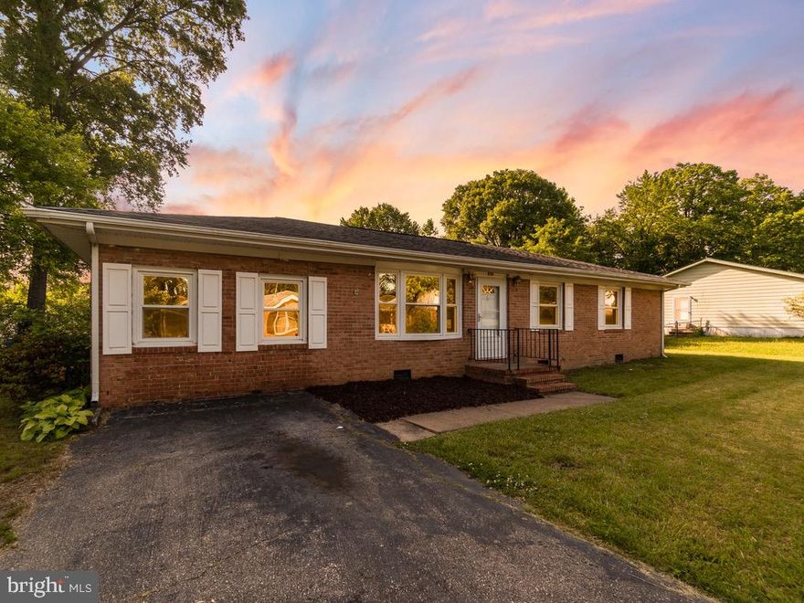 Prime location!  This pretty brick front rambler sits on a large lot with a detached oversized 2 car garage.  Spacious eat in kitchen, with separate laundry room/pantry.   Living room plus a large bonus room that would make a great theatre or gathering room.  Three spacious bedrooms,  all new carpets and  freshly painted.  Newer HVAC and windows!  This quaint established neighborhood is centrally located to all shopping and just a short drive to downtown historic Fredericksburg.
