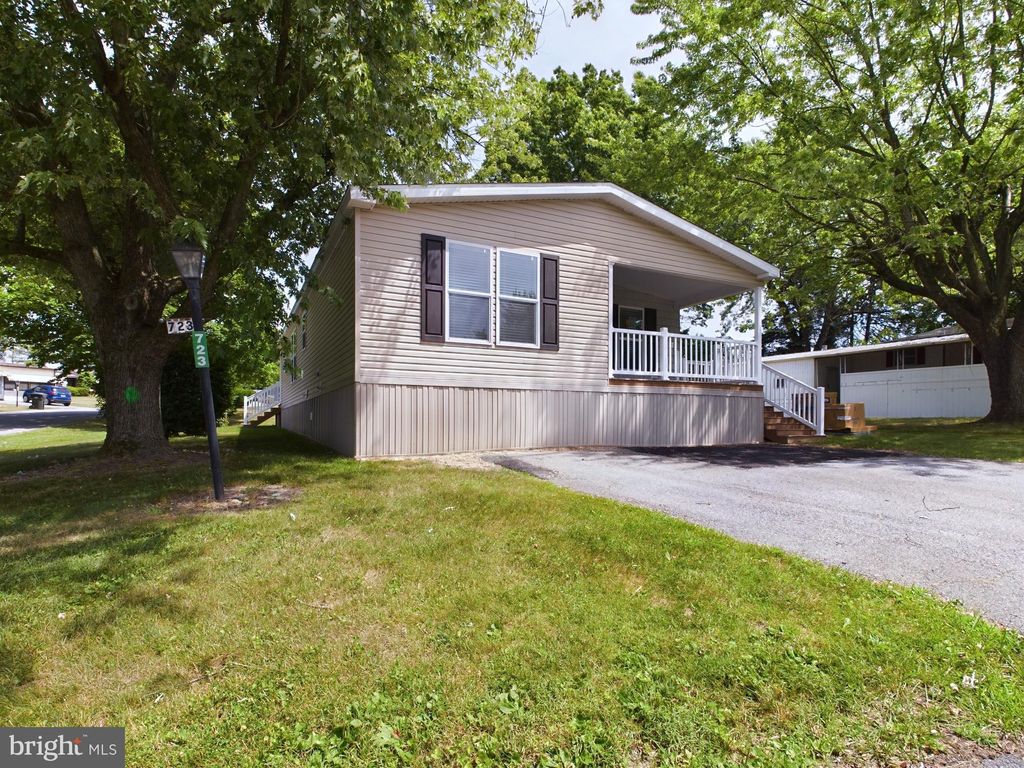 Photo of 723 Lake Drive, MOUNT WOLF, PA 17347 (MLS # PAYK2090622)