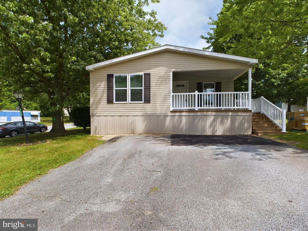 Photo of 723 Lake Drive, MOUNT WOLF, PA 17347 (MLS # PAYK2090622)