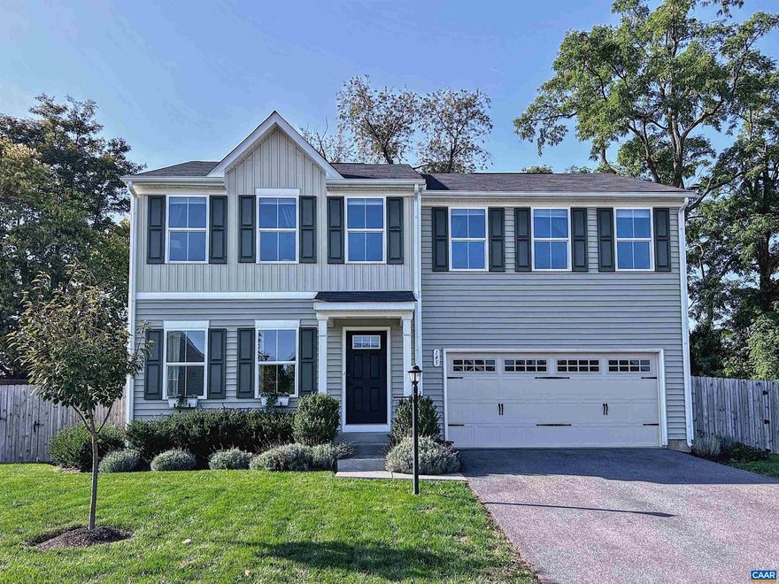 BETTER THAN JUST MOVE IN READY! This home has been lovingly and stylishly updated throughout. Boasting a larger lot from what most modern new homes afford, you will love the outdoor spaces including the beautiful flower and vegetable gardens, fire pit, and well manicured lawn all within a fully fenced private backyard. Updates include new carpet, quartz countertops, new appliances, fresh paint, luxury vinyl flooring, upgraded carpet, tile and an extensive list of custom designer finishes. The main living area is stylish, elegant and modern ? perfect for entertainers. The roomy bedrooms and closets, the spacious open floor plan allow for great livability. This truly special home, in a great side-walked friendly neighborhood, is conveniently located to everything Waynesboro, Staunton and Charlottesville have to offer.,Quartz Counter,White Cabinets,Fireplace in Living Room