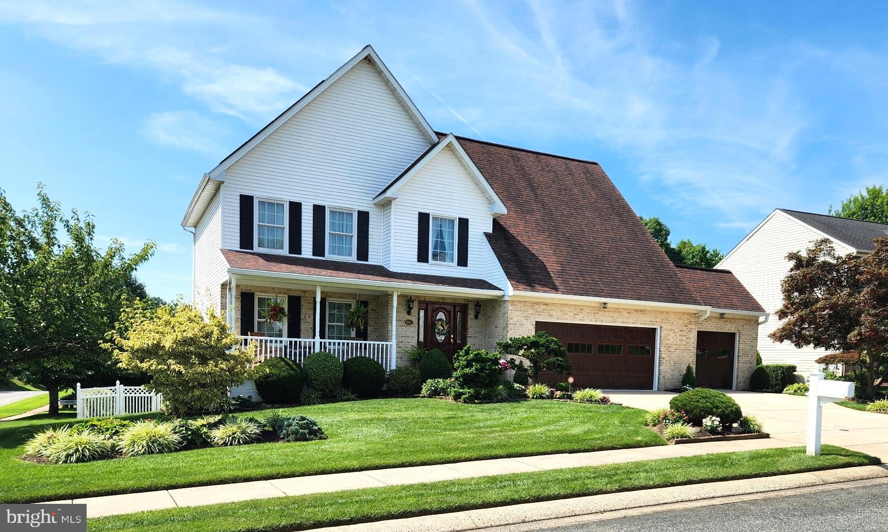 Nestled in the serene Forest Lakes subdivision, this impeccably maintained Colonial home offers a perfect blend of comfort and style. Built in 1997, this well-maintained residence boasts 4000+/- of thoughtfully designed finished living space, featuring 4 generously sized bedrooms and 2 full baths, along with 2 convenient half baths. Step inside to discover an inviting interior adorned with elegant crown moldings and chair railings. The welcoming two story entry foyer even has an electronic lowering devise for easy cleaning of the light fixture. The open floor plan seamlessly connects the family room to the eat-in kitchen, making it ideal for gatherings. The kitchen is a chef's delight, equipped with energy-efficient stainless steel appliances, including a double oven and built-in microwave, along with a pantry for ample storage. The four season sunroom w/ vaulted ceiling gives an open air feeling with a peaceful view of the yard and open space. Retreat to the primary suite, where you can unwind in the luxurious jetted tub or enjoy the walk-in shower. The primary bedroom is huge and will accomodate large furniture. There is also a very spacious walk -in storage closet. All of the bedrooms have ceiling fans and double closets.The fully finished basement, complete with a workshop and walkout access, offers endless possibilities for recreation or storage. Outside, the extensive hardscape and beautifully landscaped yard create a tranquil oasis. Enjoy the peaceful surroundings as the property backs to trees and adjoins open space, providing a sense of privacy. The attached THREE CAR GARAGE and driveway add to the home's curb appeal and functionality. With modern security features and a main floor laundry, this home is designed for convenience and peace of mind. . To top it all off, the daylight lower level offers even more living space with its 24 'x 21' recreation room, powder room and an addition 14x10 room that currenly accommodates hairdressing equipment but could make a great work out room/ office. - so many possibilitie. Experience the warmth and charm of this delightful property, where every detail has been crafted for comfort and enjoyment.