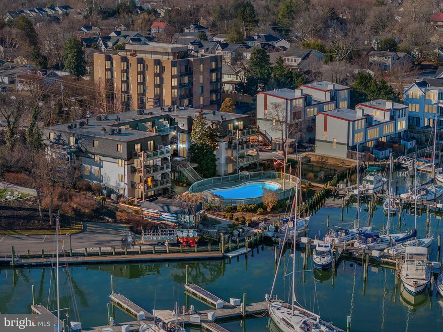 Boating season is just around the corner—embrace the maritime lifestyle with your very own  waterfront slip at 319 6th Street, Annapolis, MD 21403. Boat size is limited to 34' length overall.  Situated in the heart of Eastport, this sought-after marina places you in the Sailing Capital of the World, where boating isn’t just a pastime—it’s a way of life. Beyond the convenience of docking in a prime location, this slip comes with access to resort-style amenities, including a sparkling pool, fitness center, sauna, game and billiards room, and a party space for gathering with fellow boaters. One of the few marinas in Annapolis that allows liveaboards, this is the perfect opportunity for those looking to fully immerse themselves in the vibrant waterfront culture. With two gated parking spaces and easy in-and-out slip access, you'll enjoy seamless transitions from land to sea. Walk to downtown Annapolis, world-class yacht clubs, sailing schools, waterfront dining, and boutique shops, all while being part of a community that thrives on the water. Whether you’re setting sail for an adventure, cruising the Chesapeake, or simply soaking in the stunning harbor views, this slip offers a front-row seat to the best of Annapolis, including the iconic Eastport Lights Parade. Don’t just dock—live the Annapolis boating lifestyle year-round! (Contract will be contingent for 15 days as Condo bylaws require 15-day right of refusal to other unit owners-see disclosures. )