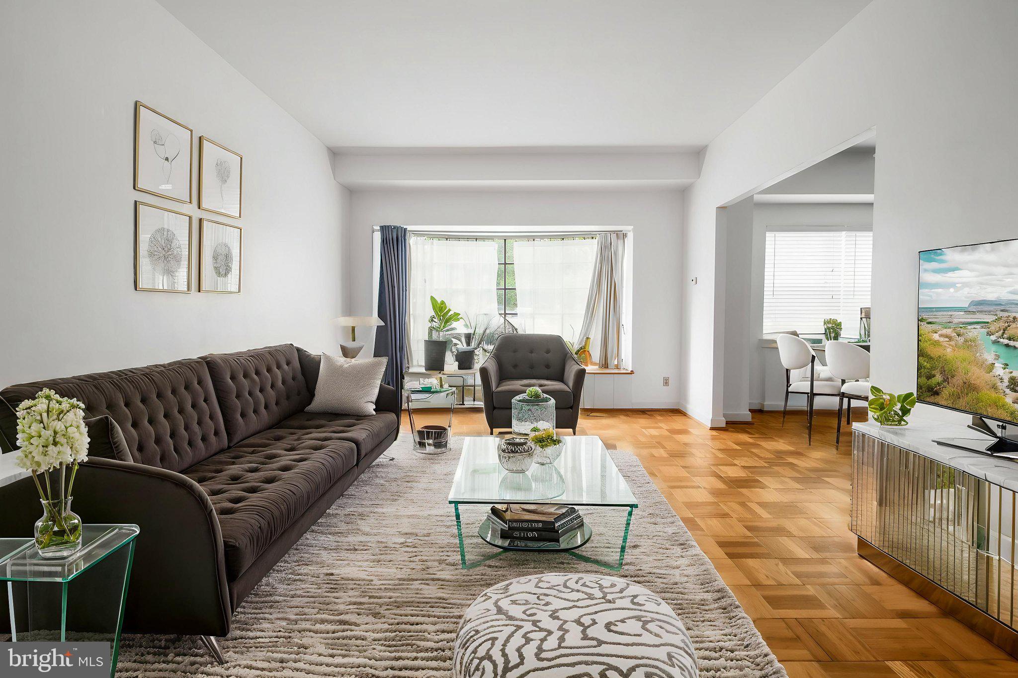 Open House Sunday July 20th, Noon! Welcome home to your luxurious, art deco dream space condo! Sun beaming through giant windows overlooking spawning green space, but just a few blocks away from the bustling Charles Village restuarants and shops, Johns Hopkins University, and Union Memorial Hospital.
Step into your large, sunny living room area , fit for entertaining, with original parquet floors and two surprisingly large closets for storage. Straight ahead, you'll be drawn to the ceiling to seating bowed windows. Around the corner, you'll find a modern kitchen with upgraded appliances and gorgeous wood cabinetry, with enough space for your eat-in Golden Girls table and cheesecake.
Across the way, you can ease into your private bedroom suite, with more giant windows and those beautiful original floor tiles, two functional closets. Decent sized full bathroom with original tiles and mirrors, all in great condition.
This condo has everything! 24-hour exceptional desk service, gorgeous lobby area and just-active-enough-condo-community, attached parking garage space, storage space, a healthy reserve fund, and more charm at every step.
Everything is in great condition, ready for you to move in and start your next chapter, in this haven of central north Baltimore.