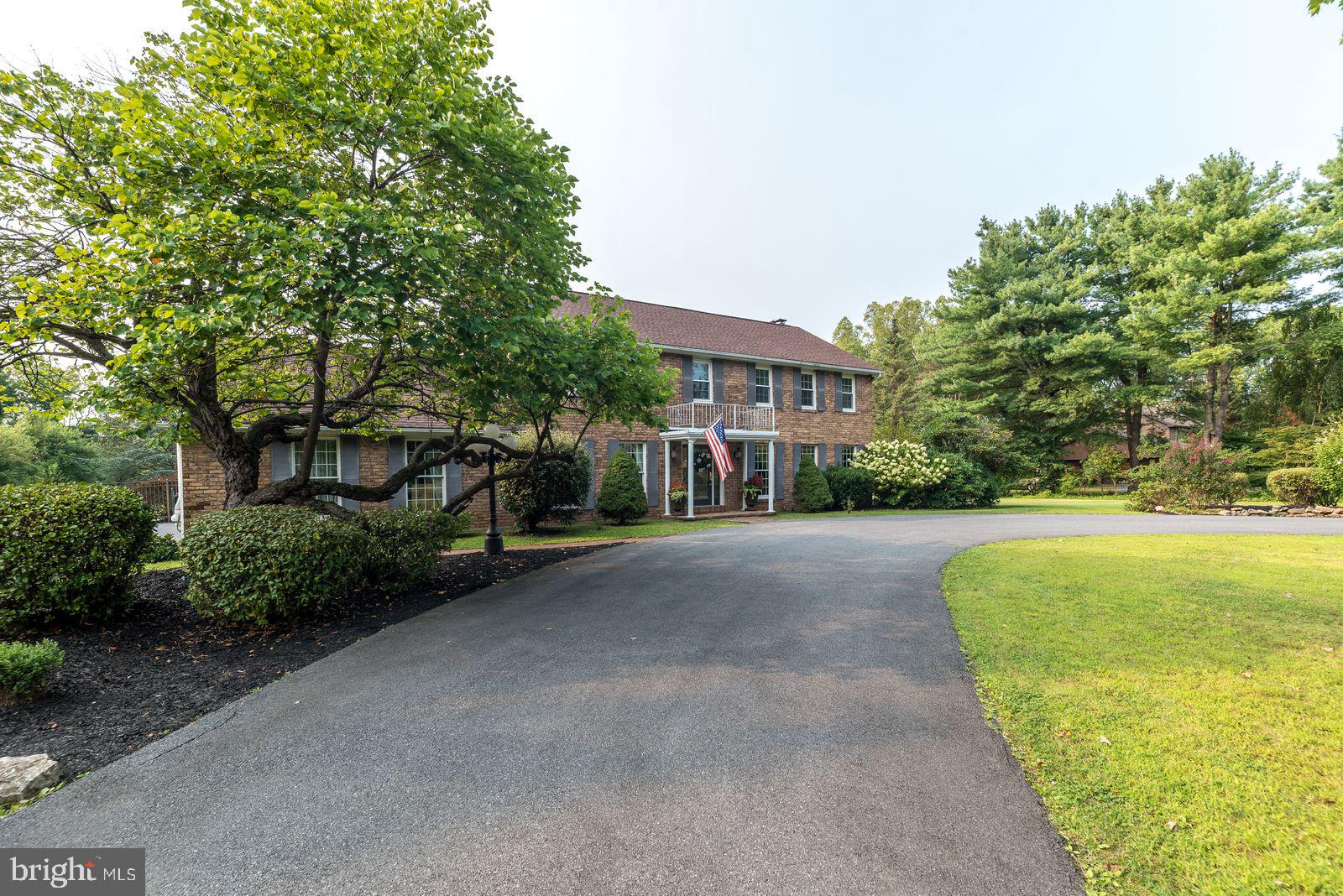 *Open House, 9/21 from 1-3, Showings start 9/19.*
Don't miss this fabulous, updated home on a 2.5 acre private oasis backing to Green Pond Country Club. Step inside the threshold to embrace this stunning home w/ gorgeous hardwood floors, natural light & many recent improvements. The kitchen features a GE built in fridge, induction cook-top, large center island, double-wall ovens, & granite countertops. The family rm features a full stone fireplace, & recessed lighting w/ French Doors leading to the heated sunroom w/ skylights,& vaulted ceiling. The 1st floor office, or 5th bdrm has an adjacent full bathroom & can be used for extended family living. The primary suite is large & bright & has a newly remodeled primary bath. The basement features a 2nd fireplace, bar, & family room. Transition easily to the outdoor space via the covered porch, w/ teak flooring, & a retractable screen. The expansive patio meets the inground pool w/ slide & is where summer days will be spent, surrounded by shade trees, beautiful landscaping, & a gazebo. An abundance of parking exists with a circle driveway. This home is truly a haven and offering the best of both worlds with both its privacy and convenience. Conveniently located just 6 miles from downtown Bethlehem, proximate to 33,22, and 78. Louis Moore park & Bethlehem Twp park are located less than a mile away. Add the convenience of being just steps from St Luke's Anderson & Lehigh Valley Hecktown, & nothing is missing from the incredible jewel!