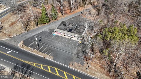 Photo of 305 Lakehurst Road, BROWNS MILLS, NJ 08015 (MLS # NJBL2096946)