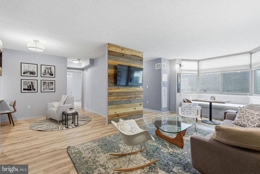 One block to Bethesda Row and just a few blocks to Metro, this spacious corner residence
offers the largest one-bedroom + den layout in the building at 762 s.f.
The home has been thoughtfully updated with luxury vinyl plank flooring, custom lighting
fixtures, renovated bath, custom home office built-in, NEW HVAC units and NEW in-unit large
capacity washer/dryer. Custom walk-in closet.
The versatile one-bedroom plus den layout provides ideal flexibility for a home office, guest
space, or reading retreat.
Garage parking and most utilities covered in the modest $607 condo cost. Perfectly positioned
in the heart of Bethesda, it combines exceptional walkability with a quiet interior setting. Dining,
shopping, and entertainment of Bethesda Row along with the convenience of the nearby
Bethesda Metro Station.