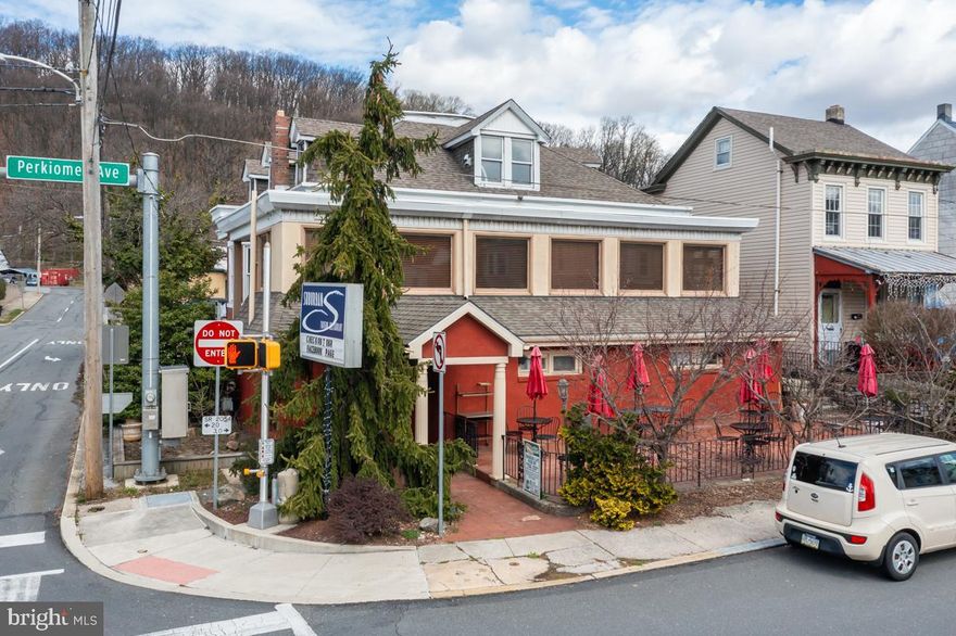 Well established Restaurant and Tavern for over 65 years with "R" Liquor License and its own private rear parking lot which can accommodate 29 vehicles. The restaurant seats approximately 60-65 people. There are also tables and chairs in the bar area in addition to 13 bar stools. The bar is well stocked with everyone's favorite liquor and beers and also has a 6 handle draft system. The dining room consists of several tables and chairs that can be configured for a quiet dinner or rearranged for a private function. There is a gas fireplace in the dining room for additional ambiance. Currently the restaurant is open Thursday-Saturday, but has the potential to be open 7 days a week with an "R" Liquor License. The restaurant boosts a full kitchen with, 6 burner gas stove/oven, broiler. steam table, deep fryer, dishwasher, 2 bay sink, handwashing sink, bain-marie, stand alone refrigerator and freezer, as well as a walk in fridge and walk in freezer. All items will convey with the sale of the real estate as they are owned and not leased. All cookware, dishes, glasses and shelving for storage will also convey with the sale. Patrons can also enjoy their dinner and libations on the outdoor patio. The patio can accommodate another 20-25 people. The second floor is currently being used as a cigar lounge that is open Tuesday-Saturday. It features a well stocked humidor and the opportunity to indulge in a top shelf cocktail while enjoying your premium cigar. There is a full bar upstairs that is covered with the "R" Liquor license as well. It has been rented for private events, meetings, etc. with Wi-Fi availability. Next to the restaurant is a detached 3-4 bedroom home which is on the same deed but has its own tax ID# and is currently rented. There is also an additional free standing, 2 story building/workshop roughly 22' x 28' located in the rear of the parking lot. This building has it's own electric, water/sewer and heat. It would be an ideal set-up for a contractor, plumber or anyone else in the trades business, as well as a professional business. Currently this building is not rented. Rent alone for these properties has the potential to bring in revenues of $50,000+/year. The taxes, assessed values and acreage reflect both Tax ID #s. ALL REASONABLE OFFERS WILL BE CONSIDERED!  Breakdown of rents would be the following:  1 Bedroom apt attached to restaurant
 $1000 minimum/month, 3-4 bedroom free standing house $1600 minimum/month and free standing building in rear of parking lot $1800 minimum/month.  Building in the rear of parking lot needs a total renovation but has newer roof.  One bedroom apartment and free standing house need updating.
