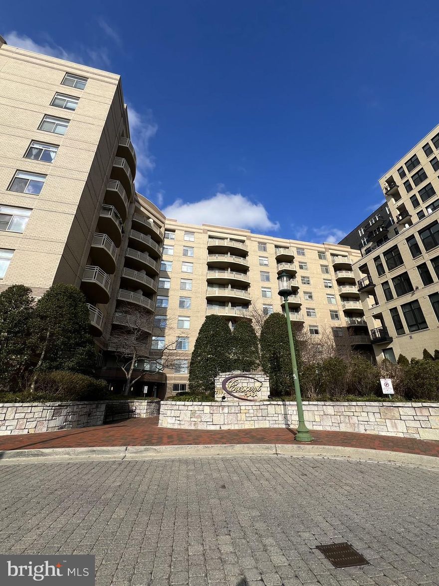 Welcome to the heart of Bethesda! Luxury condo just steps to Downtown Bethesda & Bethesda metro.  You will love the open & bright floor plan in this corner unit that offers the perfect fusion of style, convenience, and urban living.  New refrigerator & kitchen exhaust fan. The well-appointed kitchen boasts modern appliances, sleek countertops, and plenty of cabinet space, making meal preparation a breeze. The seamless flow between the living and dining room creates an inviting atmosphere, perfect for both relaxation and entertaining. The bedroom offers a tranquil retreat, with plenty of natural light and a serene atmosphere complete with a spacious walk-in closet.  The washer and dryer are conveniently located in the bathroom.  Hardwood floors throughout, lots of windows, the kitchen boasts granite, stainless steel, built-in microwave, & gas cooking. Enjoy underground parking - 1 assigned garage parking space #320 conveys (a fantastic parking spot - steps from the elevator), also bike racks. Pet friendly too!  This condo, complete with an in-unit laundry facility, and 24-hour fitness center ensures an enjoyable and comfortable lifestyle, all within walking distance and a stroll to Starbucks, Crescent Trail, Bethesda Row, Farmer's Markets, the entrance to the Capitol Crescent Trail across the street, shops, restaurants, movies & Metro. Don't miss the chance to make this exceptional home your own. Schedule your private tour and envision yourself living a vibrant and convenient lifestyle in the heart of Bethesda! The condo fee includes gas, water, AC & gym. Construction plans in office/mail room.